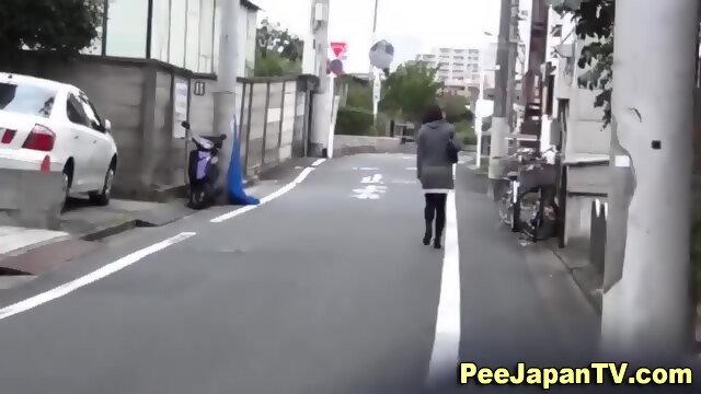 Asian Teen Squats To Piss