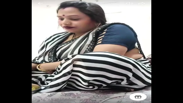 Singh-697 Neha Singh Tango Model Aunty In White And Black Saare Showing 17/02/24