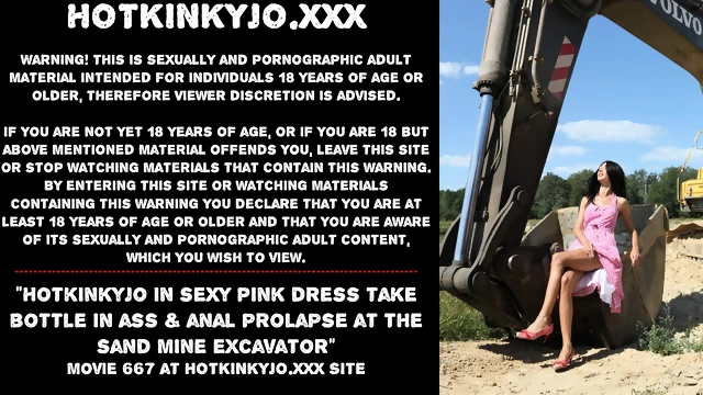 Hotkinkyjo in sexy pink dress take bottle in ass & anal prolapse at the sand mine excavator