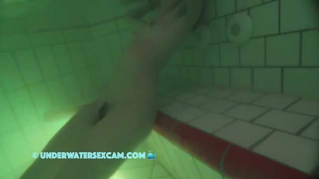 French teen 18+ masturbates with the jet stream underwater in a public sauna pool