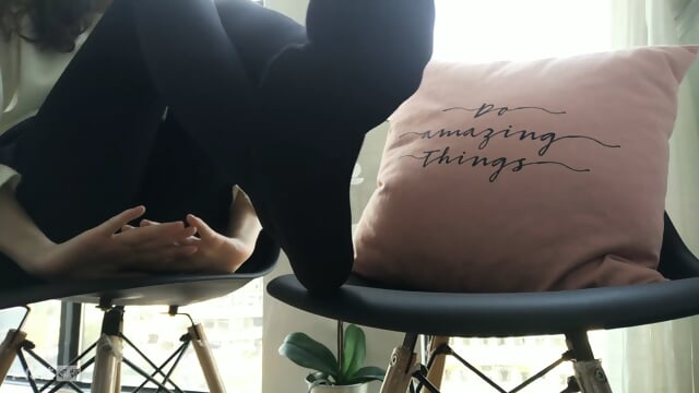 Sexy girl teasing in sexy tartan skirt