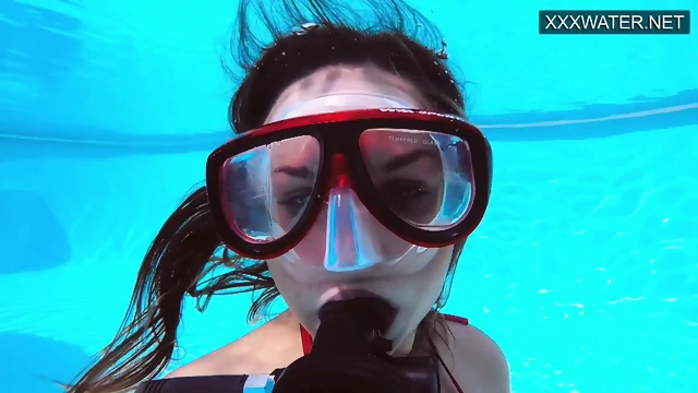 Lana Tanga toys herself underwater