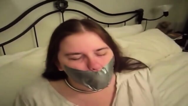 Struggling To Get The Tape Gag Off
