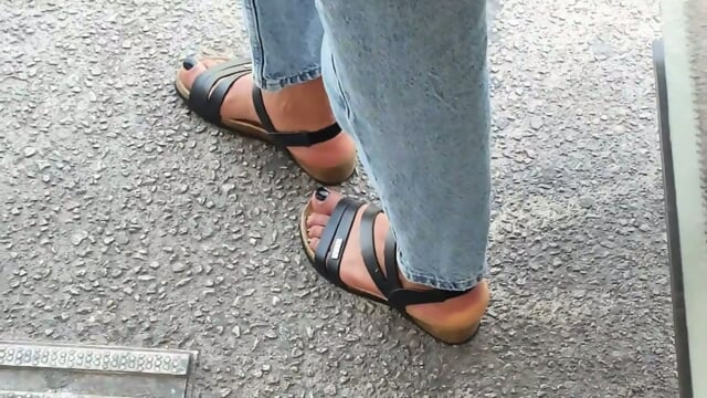 Beautiful Feet With Black Painted Toenails Of A Tall Antillean Girl (f