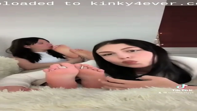 Dark Haired In Lesbians Licking Each Others Feet And Toes On The Bed