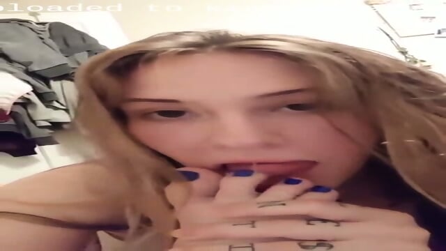 Tattooed Beauty Licking Her Pretty Toes With Blue Nail Polish Up Close