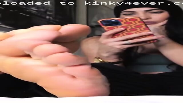 Brunette Hottie With A Winter Hat Exposing Her Gorgeous Feet And Toes