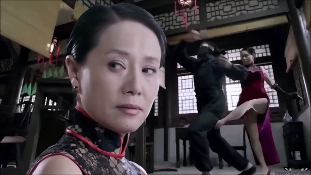 Asian KUNG FU MATURE ballbusting kick in the balls from behind