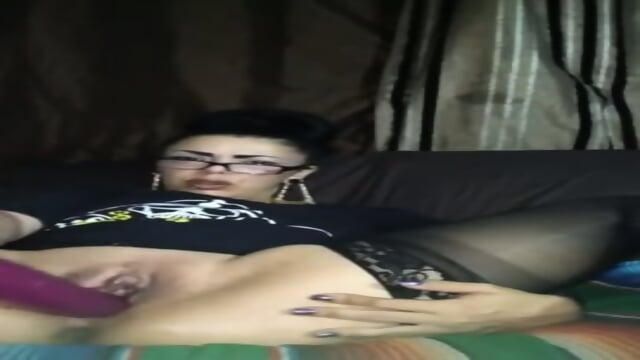 Milf enjoying her purple dildo