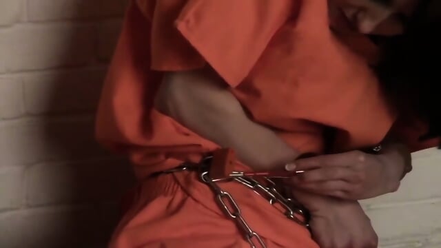 Prisoner Hannah Deals With Her Cuffs