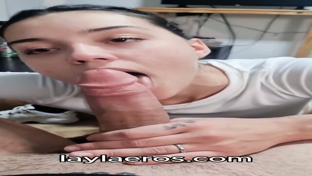 licks and sucks a huge cock