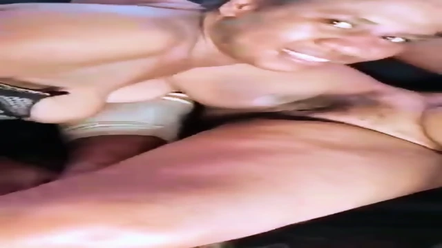 PNG lesbian sluts licking pussy in a car