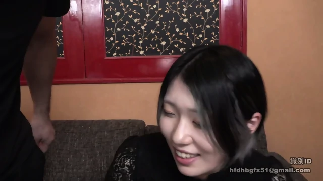 Cute Japanese Girl In Black. Colored Hair And Nice Body