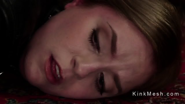 Chained lesbian sub gets anal strap on