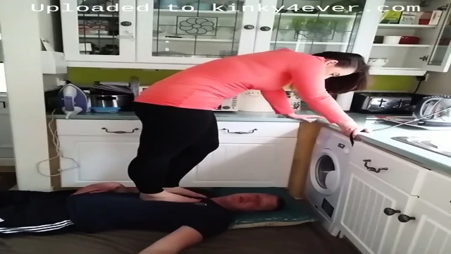 Amateur Housewife Slapping Her Mans Face With Her Feet In The Kitchen