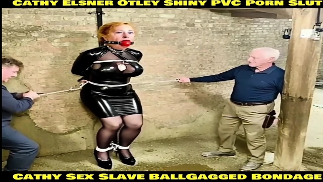 Cathy Shiny PVC Dress Slut Sex Slave BallGagged Rope Captured Bondage Otley Pornstar Wife Yorkshire Granny Kept In Strict Rope And Chain Bondage Post Tied Dressed In Her Shiny PVC Miniskirt And Platform High Heels And Black Shiny Stockings Looking Very Sl