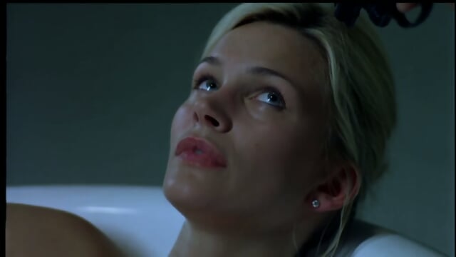 Natasha Henstridge as Crystal Ball - Second Skin (2000)