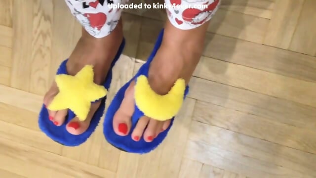 Girlie Fuzzy Moon Flip Flops And Red Toenails