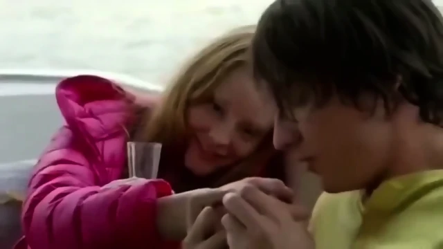 Redhead Held Handcuffed In Pink Downjacket