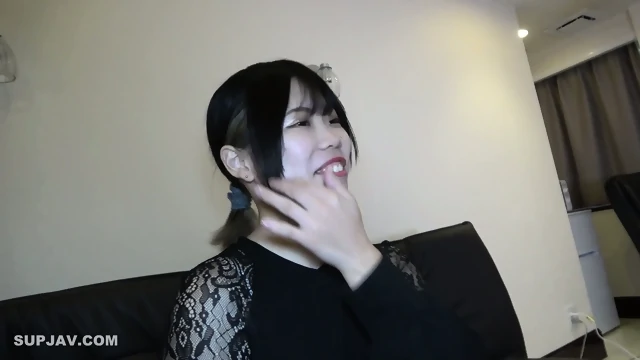 Cute Japanese Teen In Black. Nice Smile And Facial