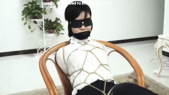 Asian Girl In A Shibari Chair Tie