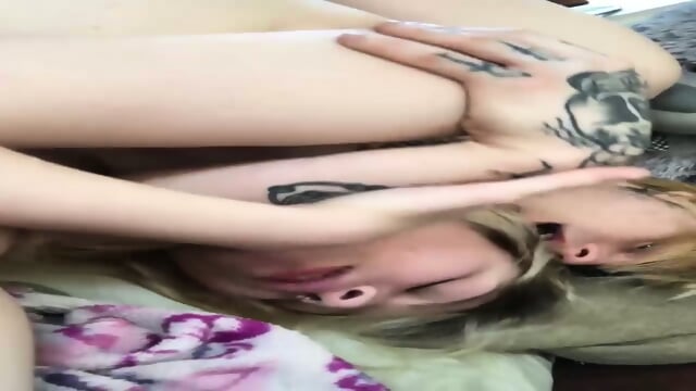 Tattooed couple recording home sex video