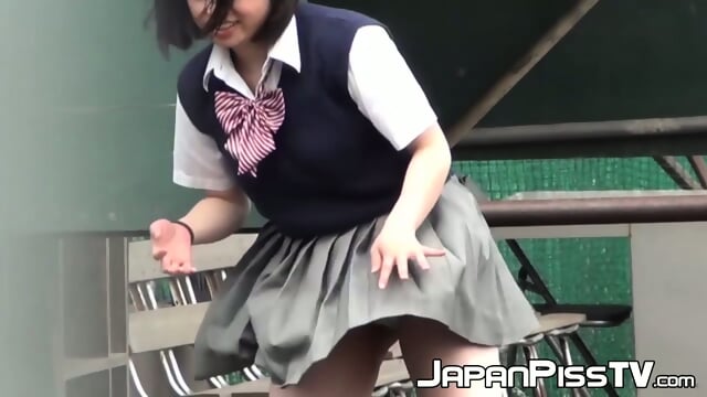 Japanese teen schoolgirls are playing and peeing outdoor