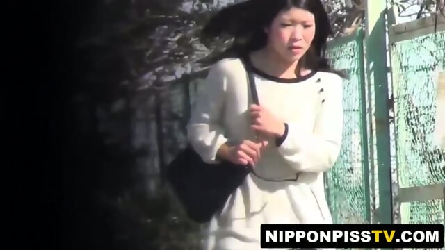 Restrained Japanese cutie gets drenched in her own warm urine