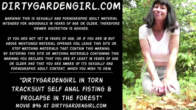Dirtygardengirl in torn tracksuit self anal fisting & prolapse in the forest
