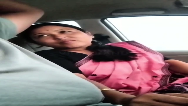 Cute Assamese wife blowjob to husband in running car