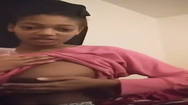 Alexus Wright is showing you her breast with her large dark nipple