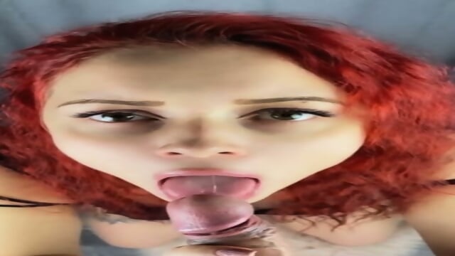 Redhead baddie with big tits giving blowjob