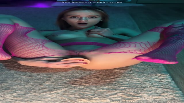 Mirraxx In Fishnets Masturbates With A Dildo