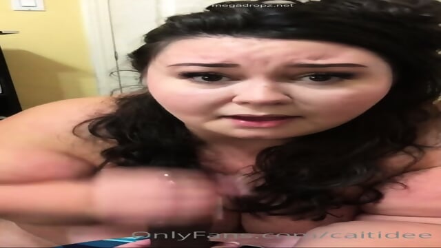 Caitidee Blows A Black Dildo