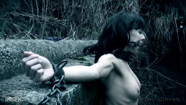 Brunette In Shackles