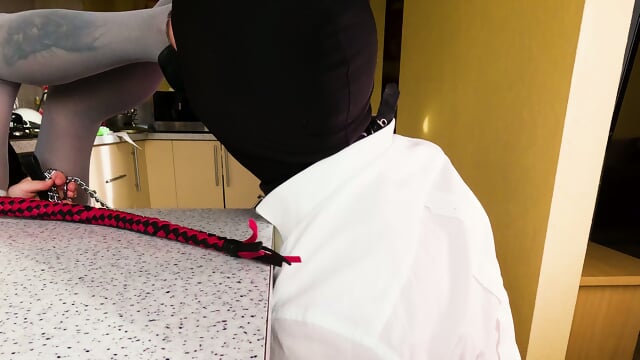 The_Girl_Walks_The_Slave_Cleans_The_Shoes_With_His_Tongue