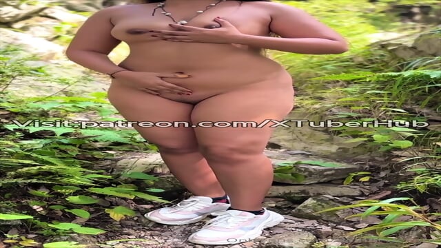 Naked beauty walking in the forest