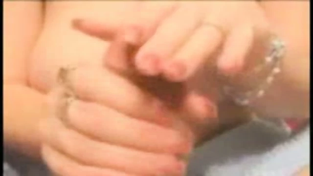 Big titted chick giving a handjob