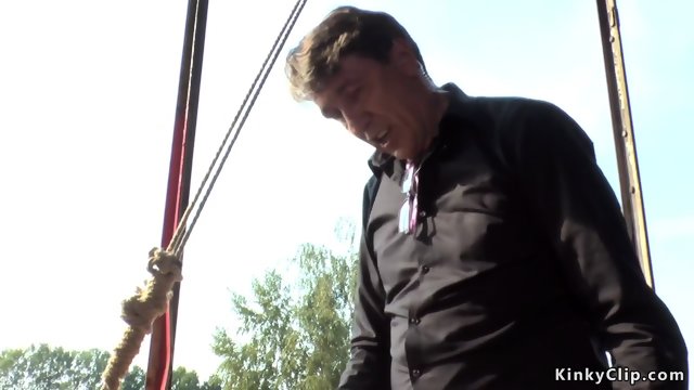 Shaved head slave fucked in abandoned building