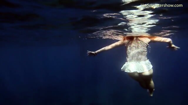 Swimming gracefully naked underwater