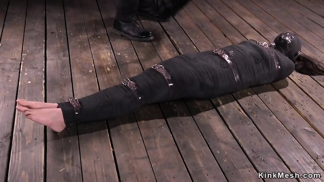 Mummified brunette gets hard flogged