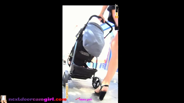 Upskirt woman whit gstring in the street