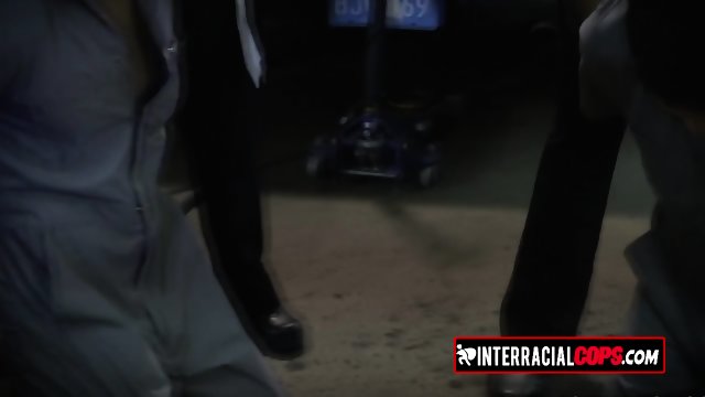 A mechanic dude fucks two horny cops after they decide not to arrest him and getting his black cock.