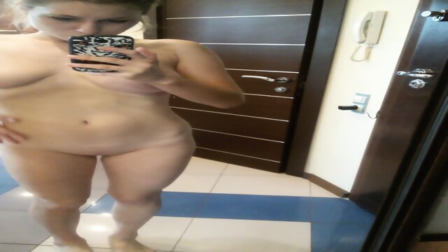 Beautiful teen show her big tits and naked body in mirror