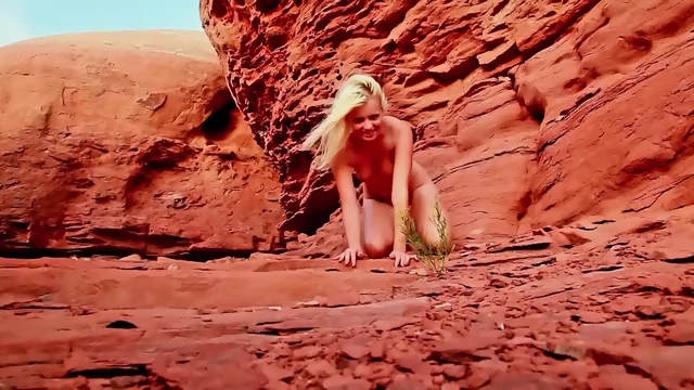 Blonde Striptease In The Mountains