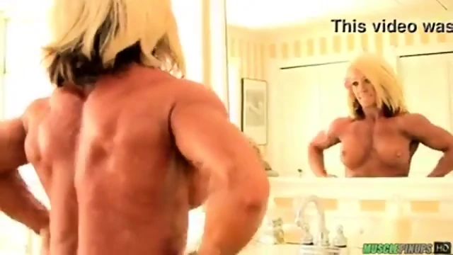 Laura topless flexing