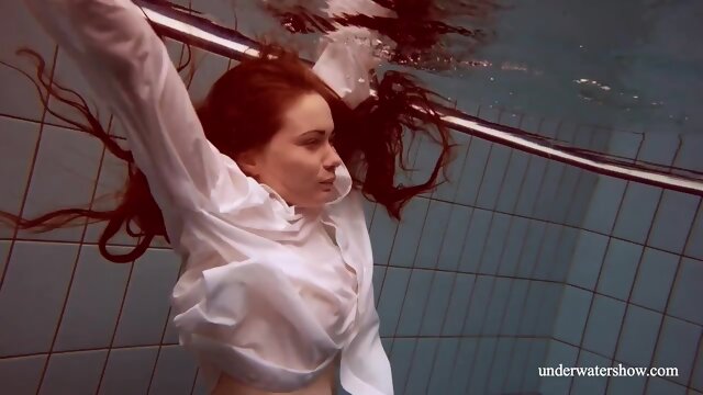 Big tits redhead Lola underwater nude