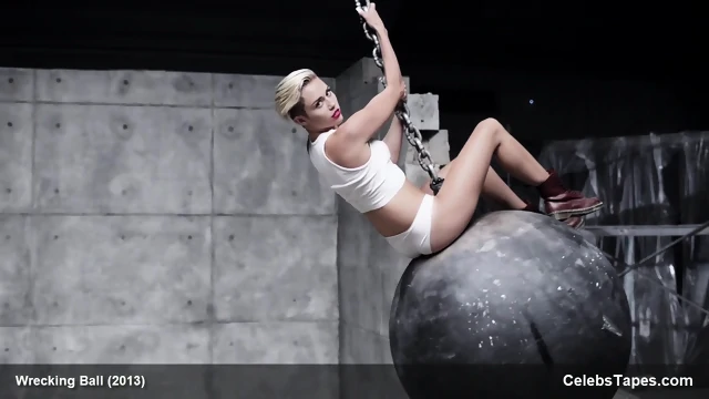 Miley Cyrus completely naked on the ball