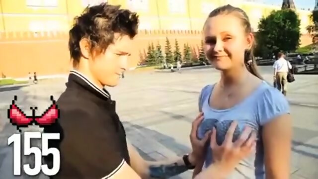 guy touches a pair of boobs in public