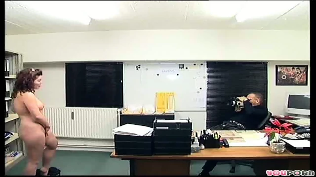 brunette fingers herself in front of camera